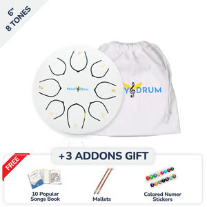 A 6-inch 8-tone steel drum set shown with its white drawstring bag, plus promotional text and gift items including a songs book, mallets, and colored numerals. The product is branded with 'Balmy Drum'.